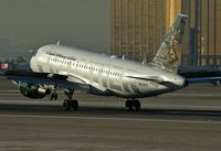 N930FR @ KLAS - Frontier Airlines - 'Cougar' / 2004 Airbus A319-111 - by Brad Campbell