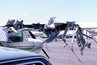 N8AZ @ DPA - Bellanca being propped started and jumped into tail of C152. - by Glenn E. Chatfield