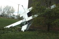 N5488B @ DPA - Out of fuel, landed on roof and went over the side.  About 3/4 mile final from Runway 33 - by Glenn E. Chatfield