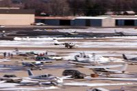 N323E @ DPA - Gear stuck in transit, landing runway 15 with fire trucks standing by.  Good job.