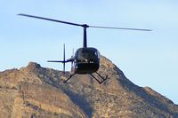 N7510N @ RRHP - Shining Star Helicopters - Las Vegas, Nevada / 2006 Robinson Helicopter Company R44 II - Red Rock Canyon in the background.