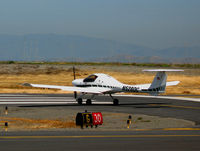 N528DC @ SQL - 2000 Diamond DA 20-C1 taxying @ San Carlos, CA - by Steve Nation