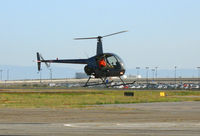 N227SH @ OAK - Silver State Helicopters 2006 Robinson R22 BETA last flight of the day @ Oakland, CA - by Steve Nation