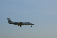 N683PF @ OAK - 1985 Cessna S550 landing in last light @ Oakland, CA - by Steve Nation
