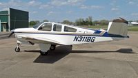 N311BG @ KMIC - Parked by the Crystal Shamrock hangars, 1971 Beech V35B, c/n D9276 - by Timothy Aanerud