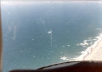 N69112 @ SMX - UFO siting. Had to get a closer look. Once, a bunch of TP got stuck in the intake and burned on the engine a little. Stupid teenaged airplane tricks. - by Dave Horn