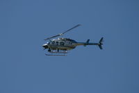 N111SP @ GRR - Michigan State Police helicopter over East Grand Rapids for recent visit of President George W. Bush - by Matt Groesser