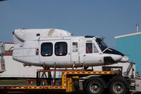 UNKNOWN @ CYYC - bell 212 on a trailer