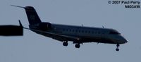 N403AW @ RDU - Looks like she's diving for the runway - by Paul Perry
