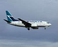 C-GWSK @ YXX - 2006 Boeing 737-6CT - by Guy Pambrun