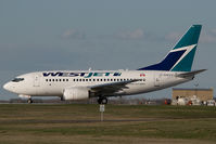 C-GWCT @ CYYC - Westjet Boeing 737-600 - by Yakfreak - VAP
