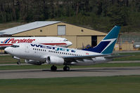 C-GWSI @ CYLW - Westjet Boeing 737-600 - by Yakfreak - VAP