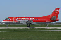 N413XJ @ YXU - Taxiing on Golf for departure. - by topgun3