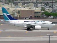 C-GWJU @ PHX - Taxiing to the gate