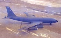 57-1463 @ CID - KC-135E parking at the base of the tower.  Film got hot, left brown haze.