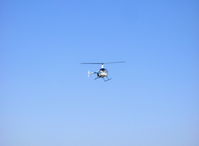 N43266 @ SZP - 1990 Robinson R22 Beta, Lycoming O-320-BC, landing approach to helipad over Rwy 22 - by Doug Robertson