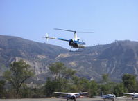 N43266 @ SZP - 1990 Robinson R22 Beta, Lycoming O-320-BC, landing approach to helipad over Rwy 22 - by Doug Robertson