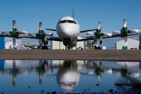 C-GZCF @ CYQF - Air Spray Lockheed Electra - reflection - by Yakfreak - VAP