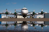C-GZCF @ CYQF - Air Spray Lockheed Electra - reflection - by Yakfreak - VAP