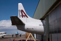 OE-ILB @ CYQF - Amerer Air Lockheed Electra - by Yakfreak - VAP