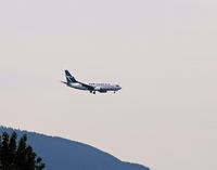C-GWSH @ YXX - On short final into YXX on a smoggy day - by Guy Pambrun