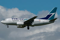 C-GXWJ @ CYVR - Westjet Boeing 737-600 - by Yakfreak - VAP
