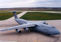 66-8306 @ CID - C-5A at the base of the control tower