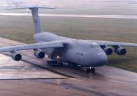 70-0449 @ CID - C-5A taxiing to the cargo ramp by the control tower