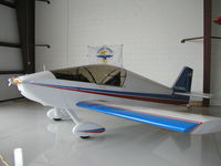 N259WB @ KLVN - Parked in the new FBO hangar at Airlake. - by Mitch Sando