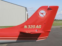N320AG @ KLVN - Close-up picture of the tail. - by Mitch Sando