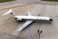 160051 @ CID - C-9B parked at the base of the control tower - by Glenn E. Chatfield