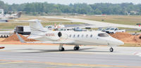 N131GG @ PDK - Taxing past on going construction - by Michael Martin