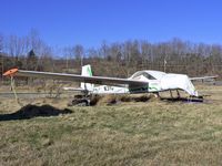 N3102Q @ FWN - Purists won't call this aircraft a glider, as it does have a small engine lurking underneath that tarp.  Neat Czech design. - by Daniel L. Berek