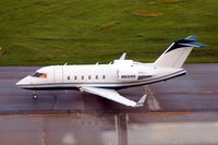 N601VH @ CID - Taxiing by the control tower - by Glenn E. Chatfield