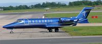 G-JANV @ EGCC - Learjet 45 shines in bright sun
