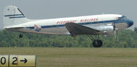 N44V @ DAN - 1942 Douglas DC-3 coming in for a landing at Danville Regional Airport. - by Richard T Davis