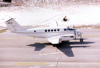 84-0181 @ CID - C-12F taxiing by the control tower