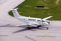 85-1266 @ CID - C-12F taxiing by the control tower