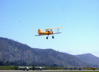 N43GK @ SZP - 1943 Boeing Stearman B75N1 as Navy N2S-5, Continental W670 220 Hp, completely restored to absolute original with all stencils and Chrome Yellow paint, takeoff climb Rwy 22 to French Valley Airport, Temecula - by Doug Robertson