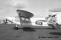 ZK-BPM @ NZAR - aerial advertising Cub - by Peter Lewis
