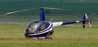 G-OLRT @ EGPE - Robinson R22Beta - by Terry Fletcher