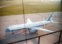 99-0004 @ CID - VC-32A parked at the base of the tower - by Glenn E. Chatfield