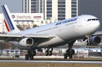 F-GLZS @ LAX - Air France F-GLZS touching down on RWY 24R.  [Canon 30D + 2X teleconverter + Canon 300mm f/2.8L IS] - by Dean Heald