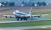 73-1677 @ CID - E-4B doing touch and go on runway 9 - by Glenn E. Chatfield