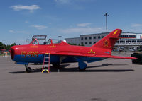 N905DM @ KBJC - Chinese Mig 17 (in Russian Red Falcons Colors) - by Bluedharma
