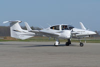 N192TS @ YXU - Taxiing on to Ramp III from Alpha. - by topgun3