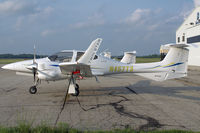 N457TS @ YXU - Parked in front of Diamond Flight Centre - by topgun3