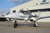 C-FSGN @ YXU - Parked in front of Diamond Flight Centre - by topgun3
