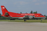 N406XJ @ YXU - Turning onto Golf from Alpha. - by topgun3