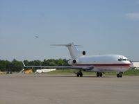 N261FL @ STL - Ready to taxi, as an American Airlines MD-83 departs in the background. - by jfavignano